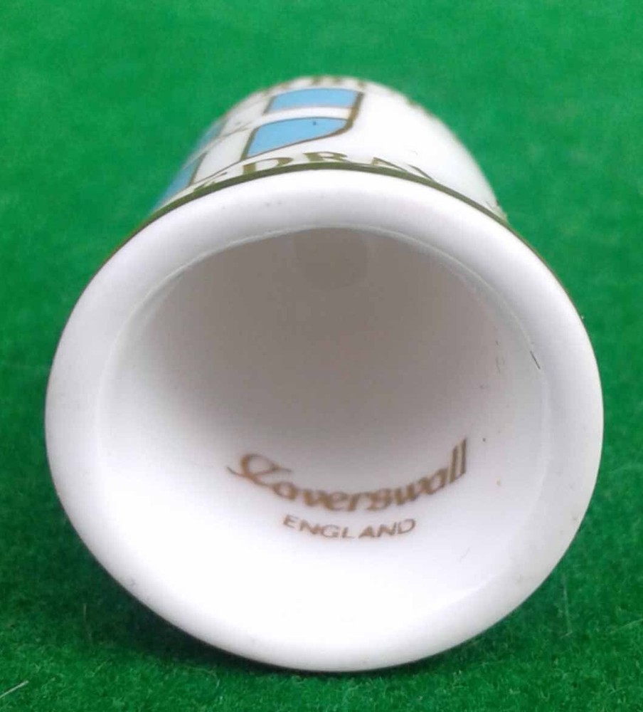 9 CAVERSWALL BONE CHINA THIMBLES.