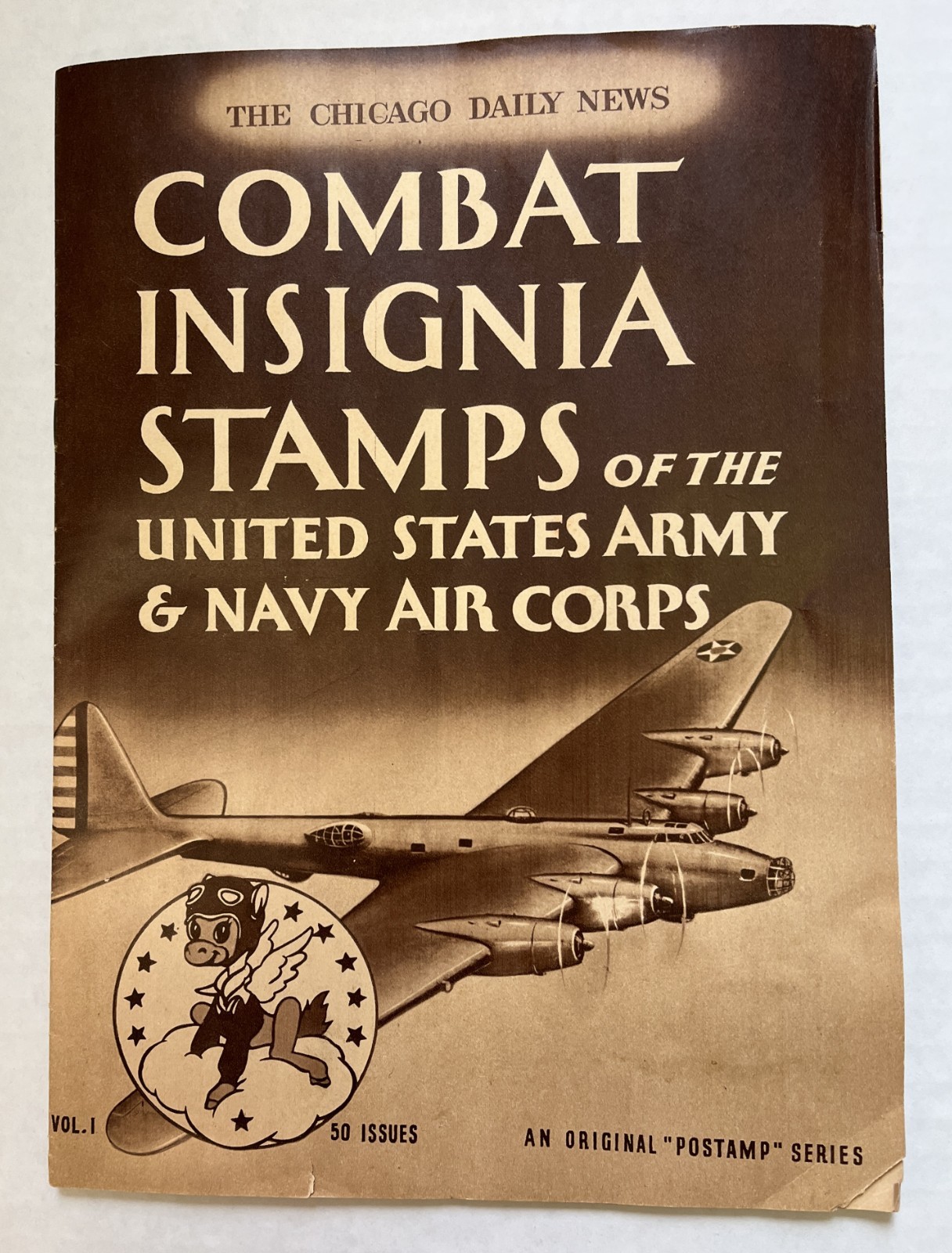 1942 Vtg WW2 Combat Insignia Stamps of United States Army & Navy book  50 stamps