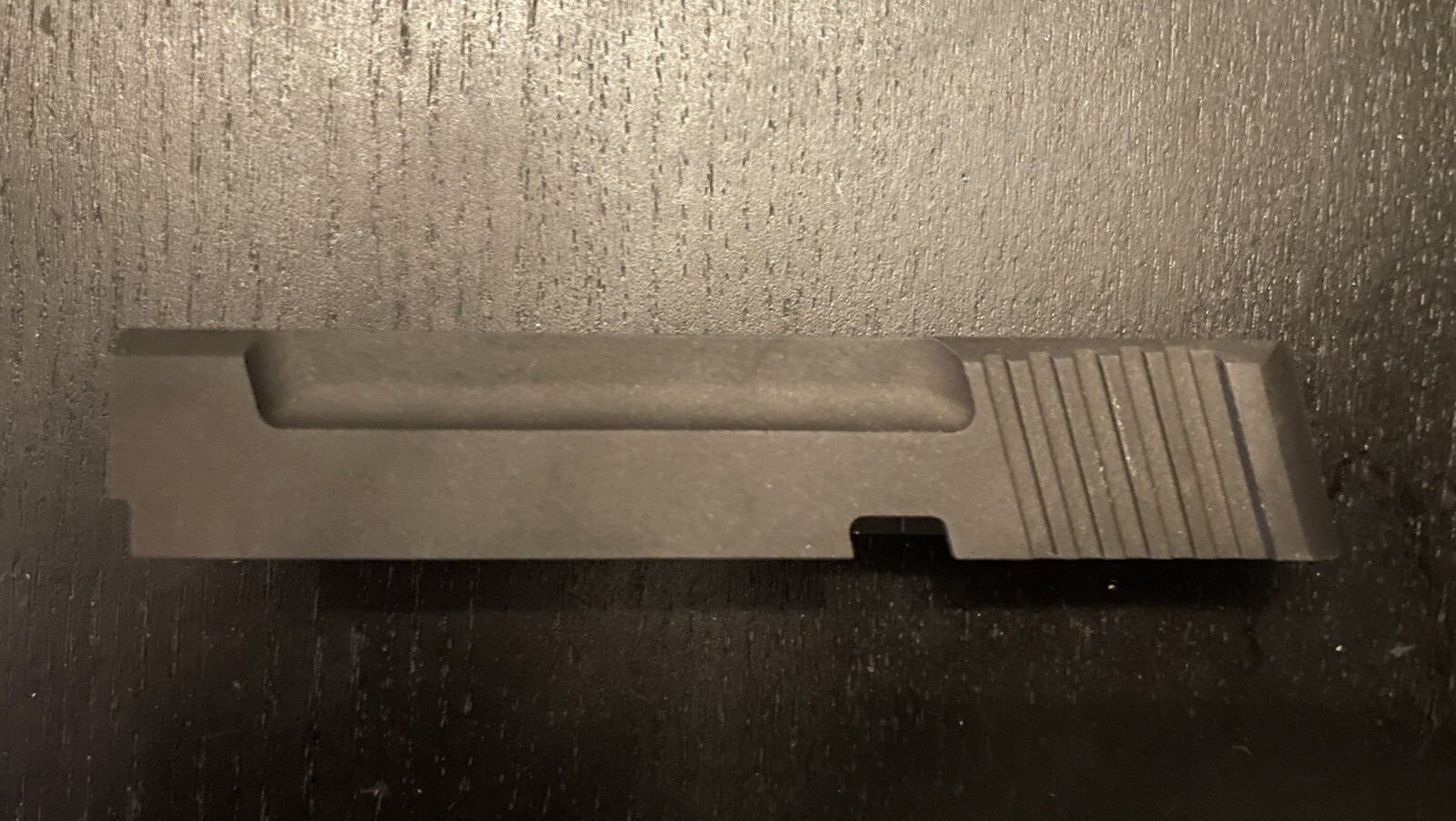 Browning, Buck Mark slide racker.