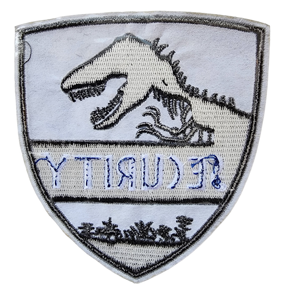 Iron On Patch featuring Jurassic Response Park Security T-Rex Boney Symbol
