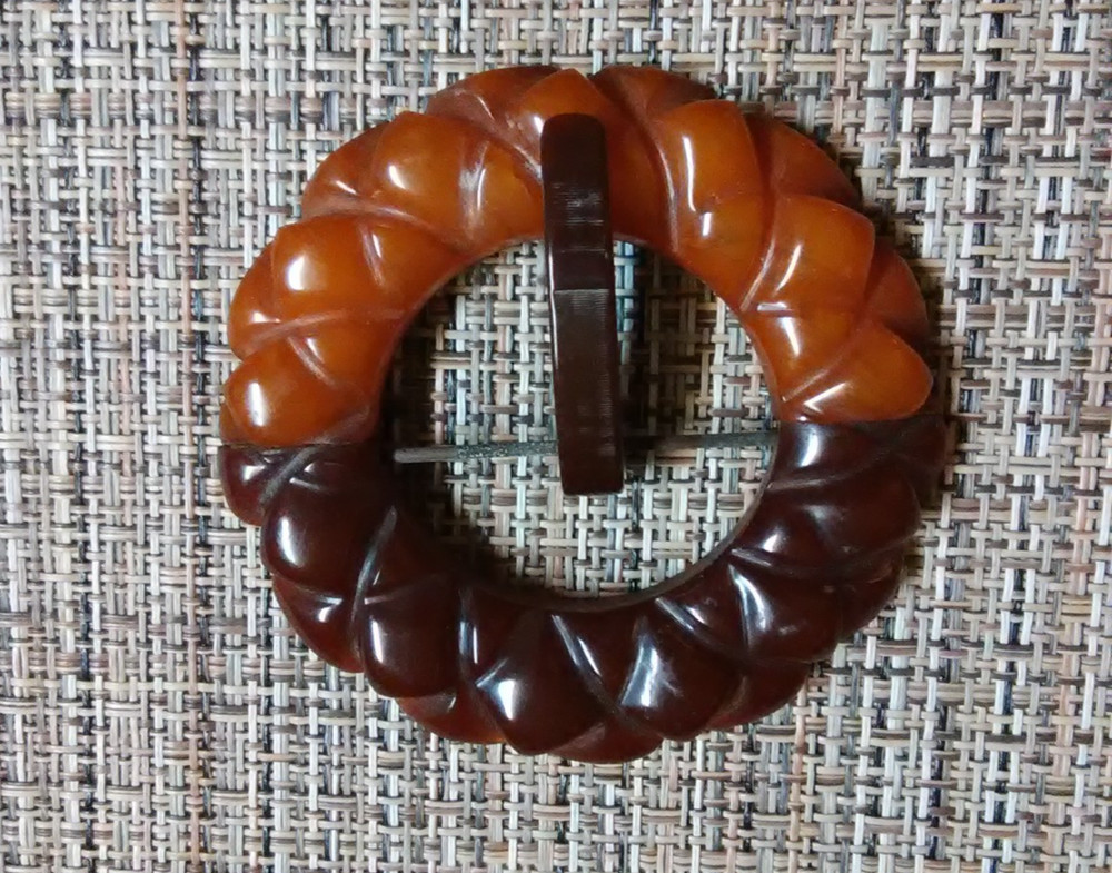 Carved Bakelite buckle