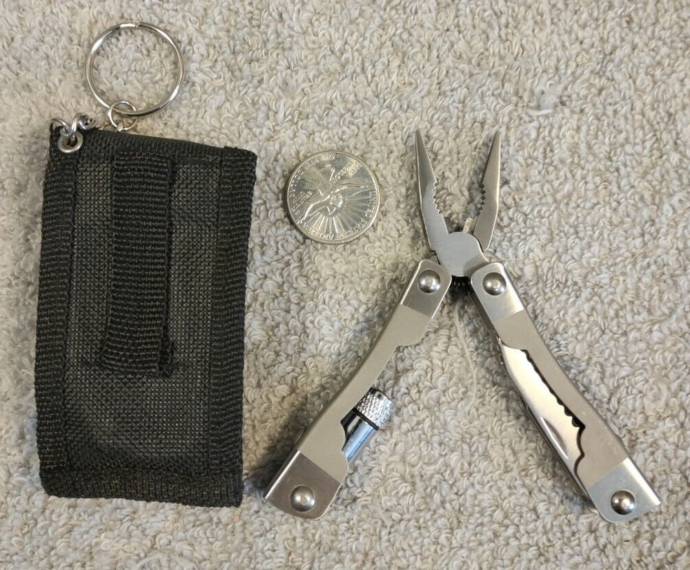 KR Multi-Tool. Belted Case And Key Ring. Light not tested. Pre-owned very nice