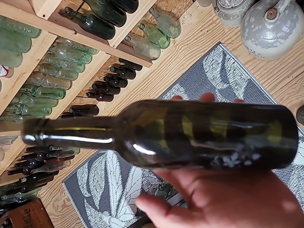 Early Wine Bottle With Etching