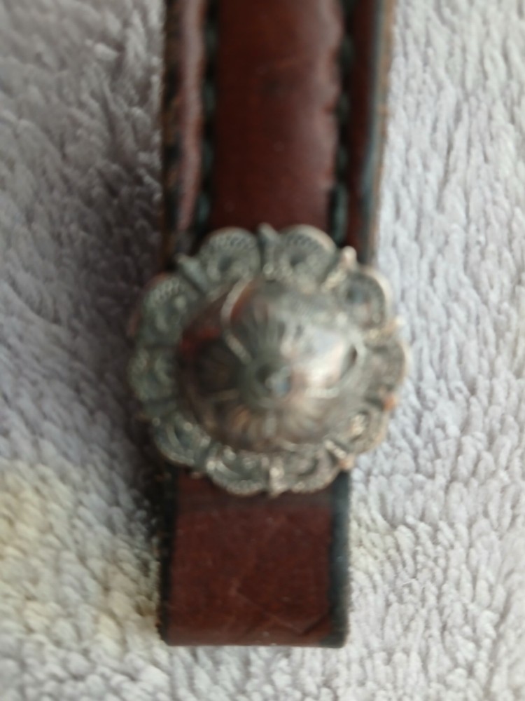 Walnut colored browband with 2 one inch silver overlaid loopback conchos