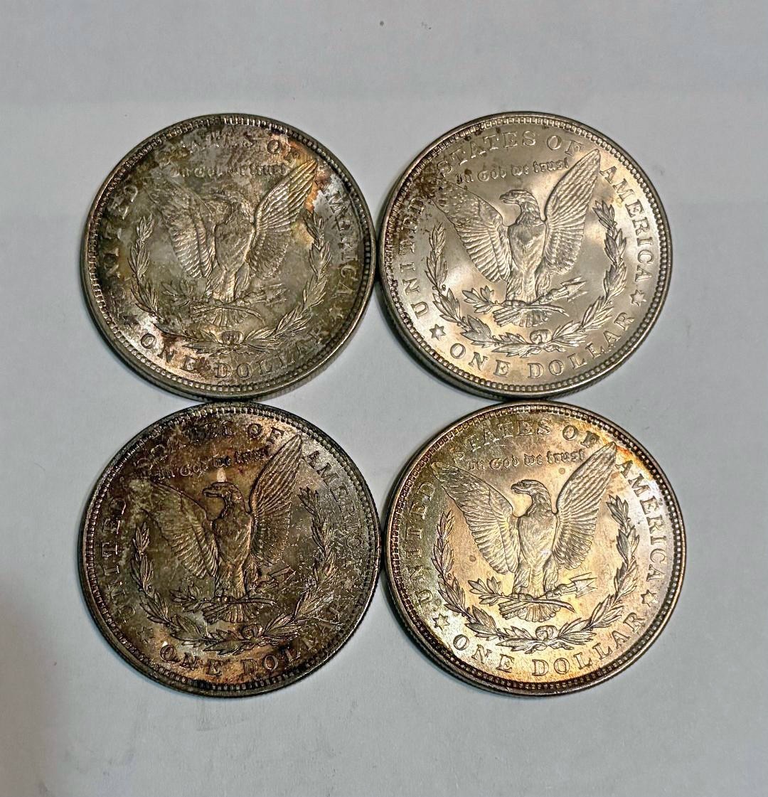 Lot of four 1921 Morgan silver dollars