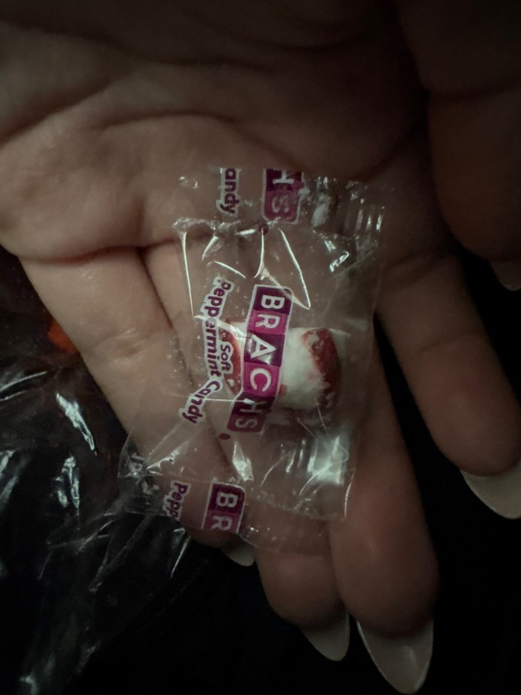 brach peppermint candy in half within bag (unopened)