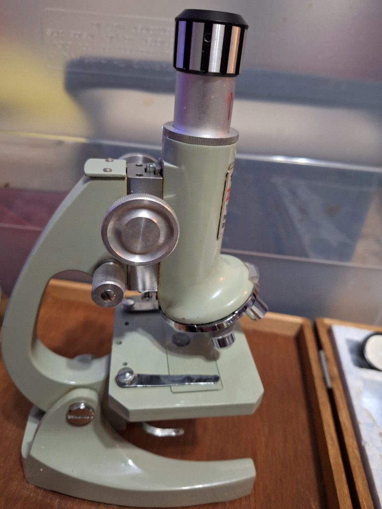 Vintage Tasco 900X Zoom Microscope.