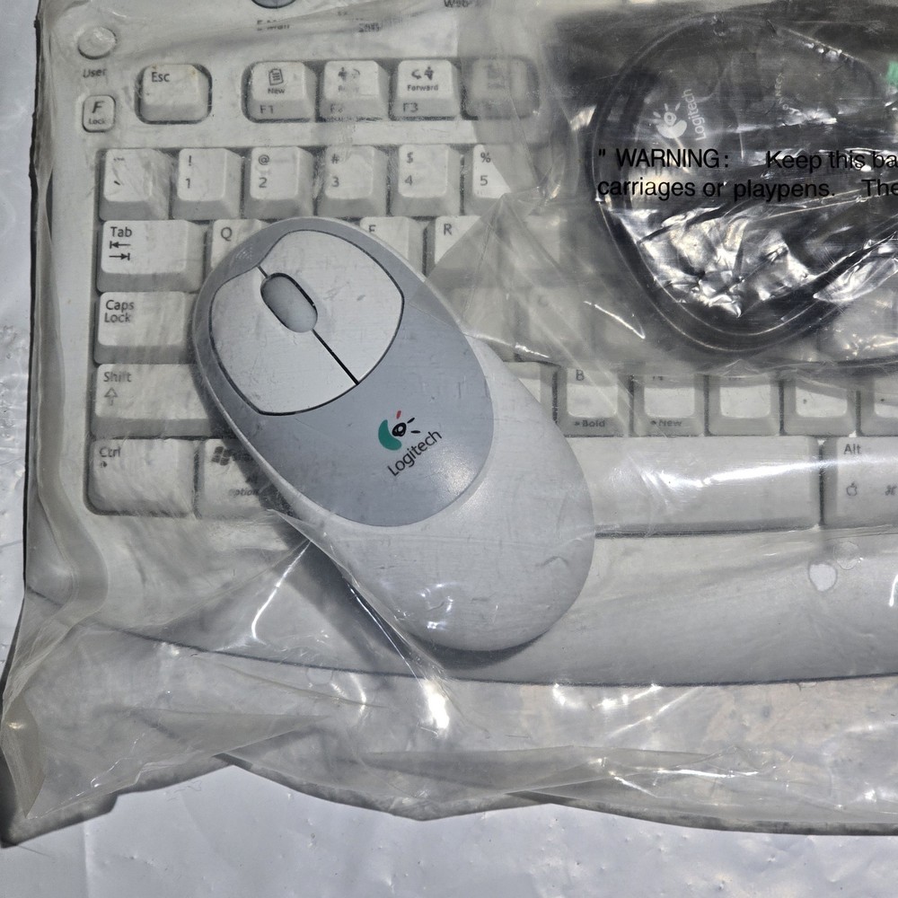 Logitech cordless Access Duo, keyboard and mouse.