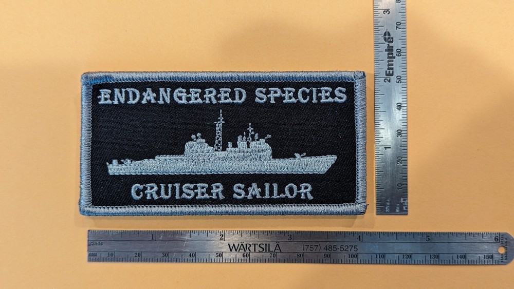 Navy Cruiser Patch "Endangered Species" (Silver and Black)