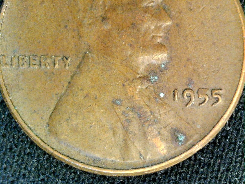 1955p Lincoln wheat cent w/ die chip on date