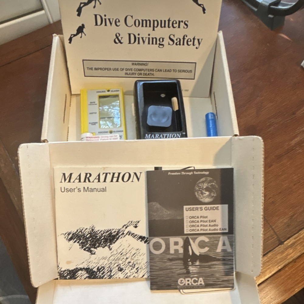 ORCA Marathon Dive Computer with Manuals, Accessories, and Lithium Battery