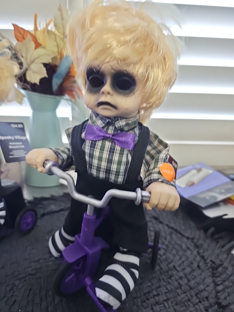 Animated Bicycle Doll