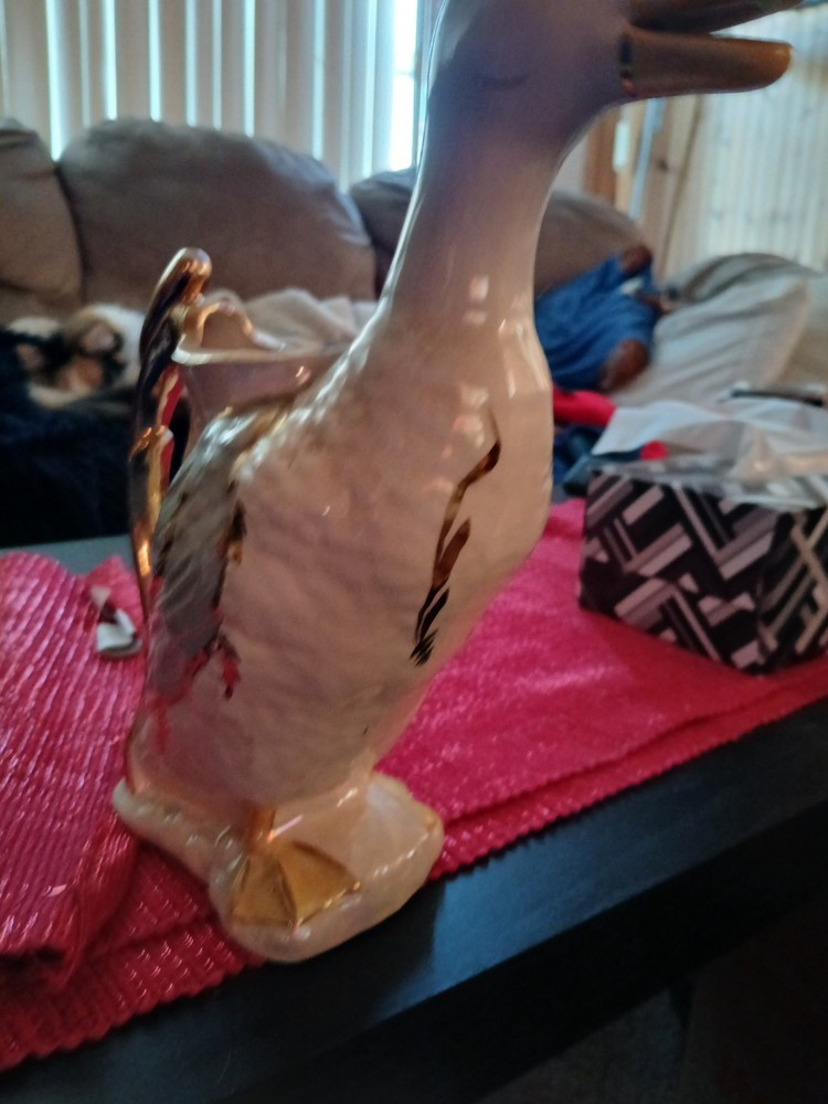 vintage ceramic or porcelain duck-shaped pitcher.