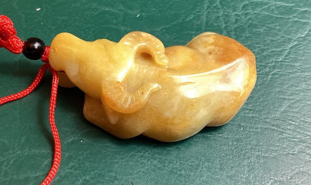 Brown 2 Sided Jadeite Ox Translucent Pendant