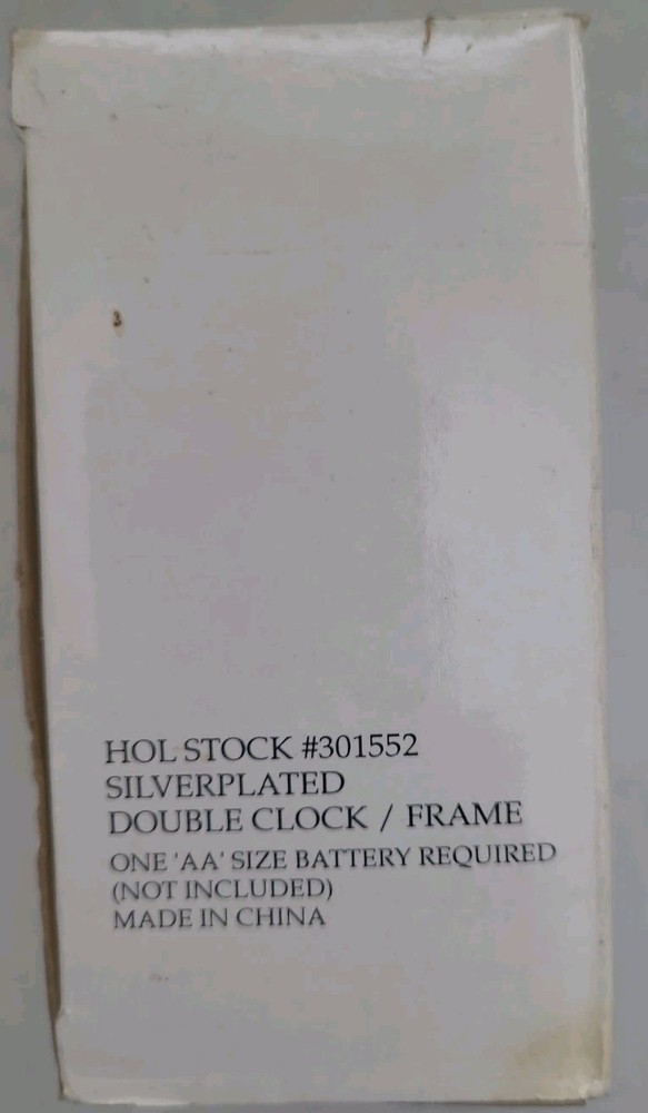 Silver plated double frame clock. International Silver Company. Open Box.