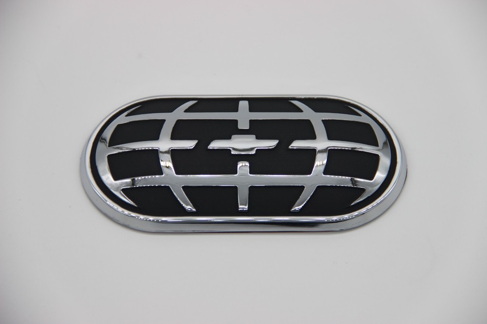 Geo globe grill emblem 5" Adhesive backing plastic