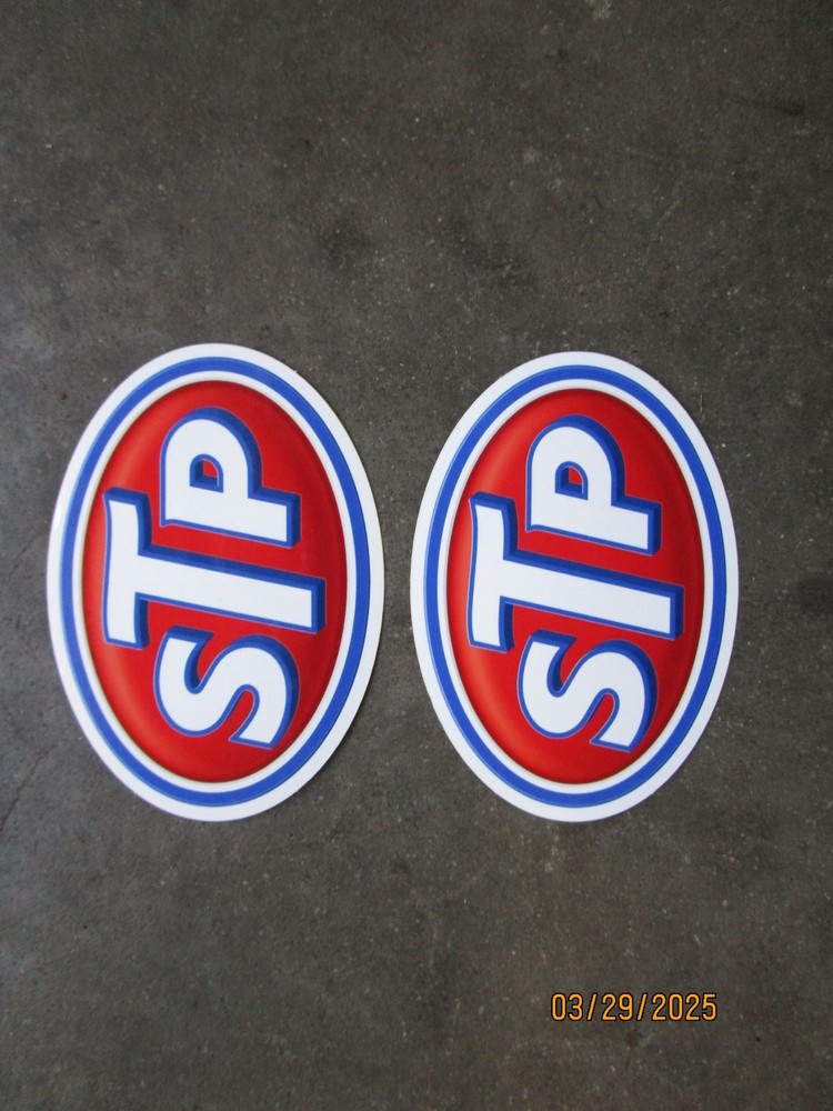 2 STP Oil Stickers 4"