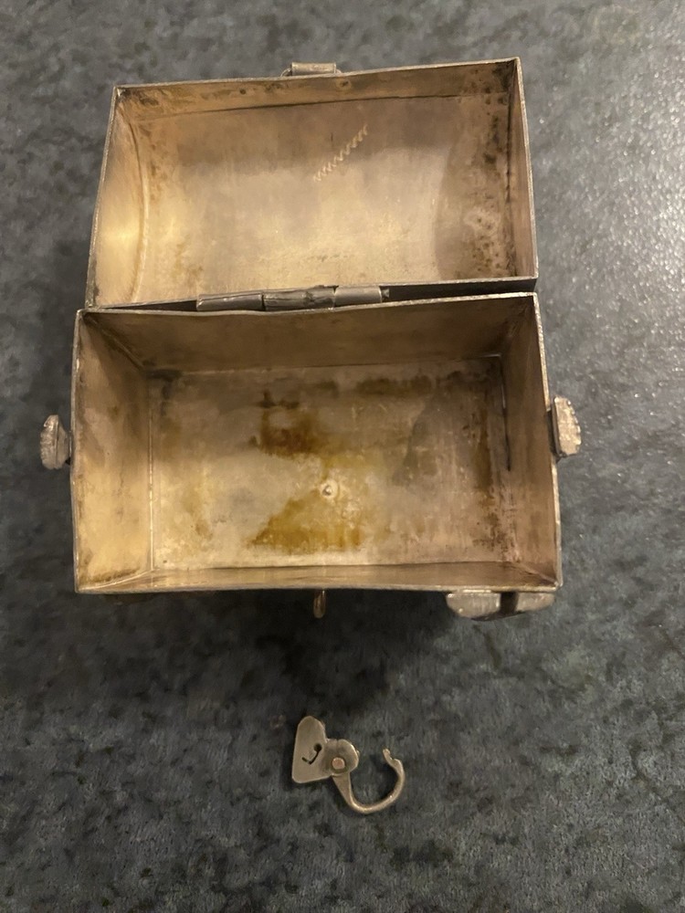 Antique Tiny Alpaca Silver Chest with embossed motifs & lock.