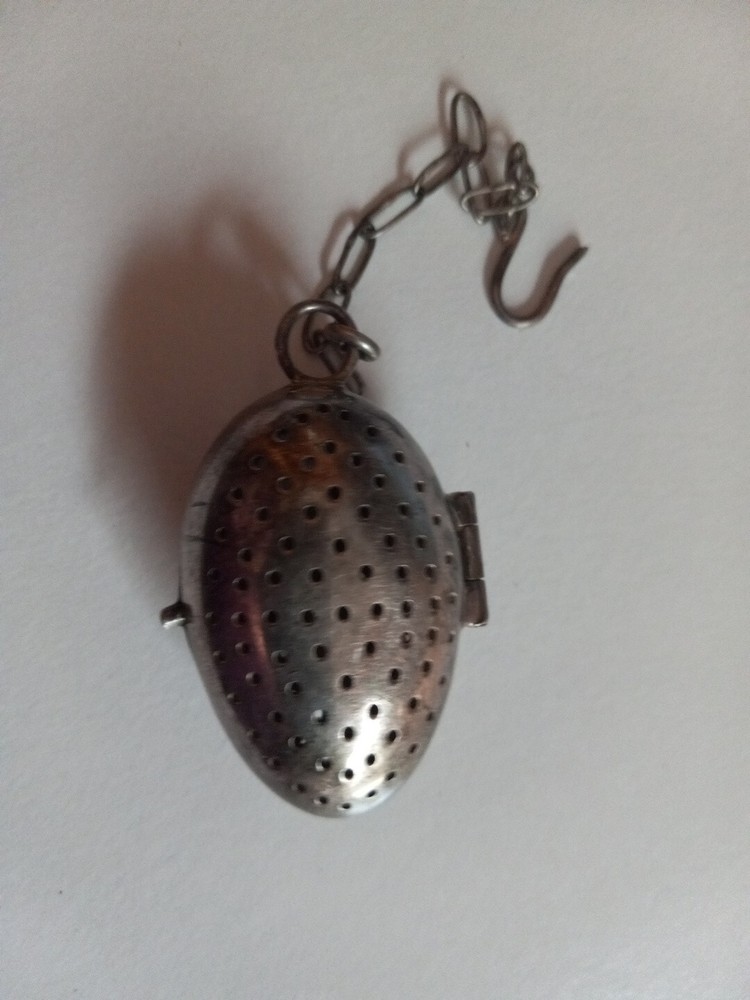 Antique Signed Silver Tea Strainer stamped AEC. Old egg shaped quality