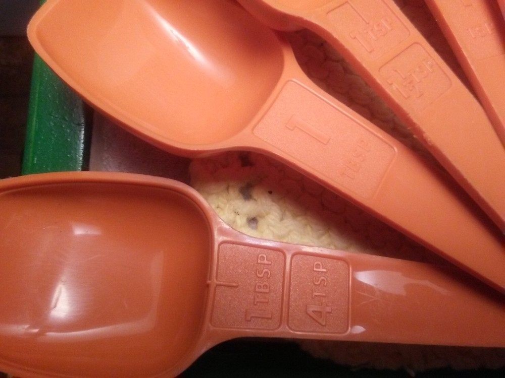 vintage Tupperware measuring spoons burnt orange