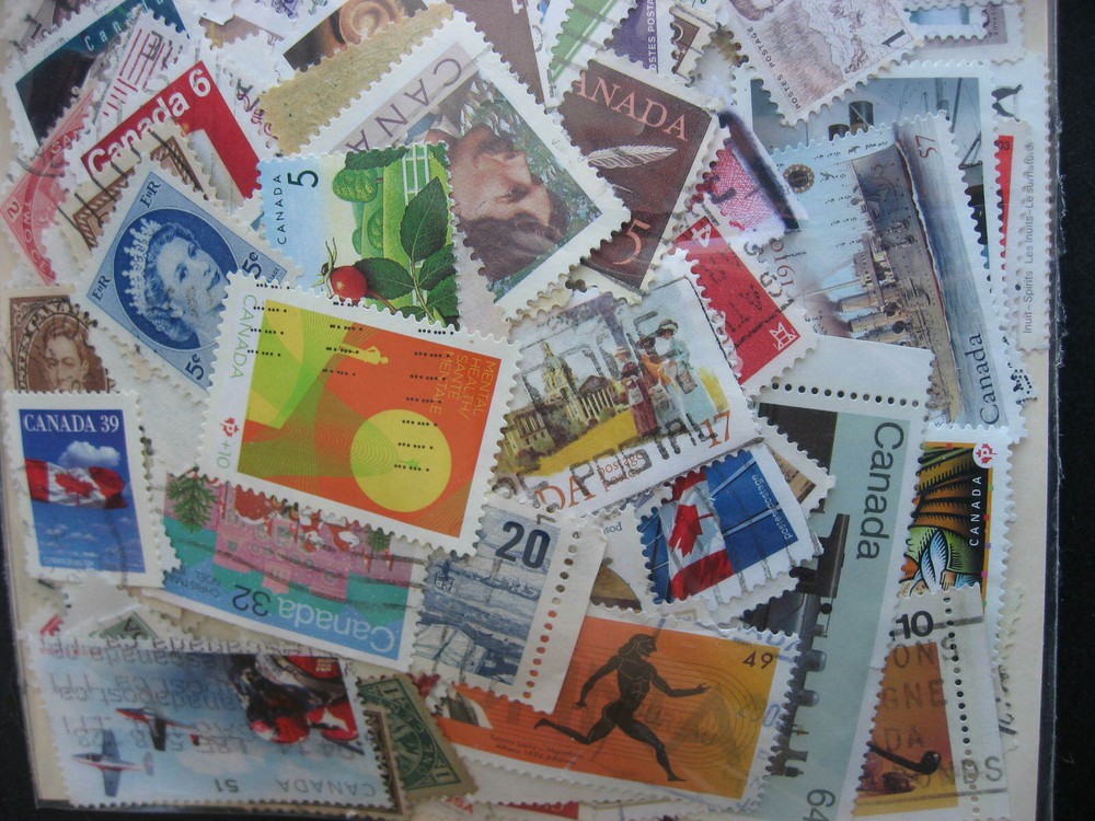 Canada colossal mixture (duplicates,mixed cond) 2000 old,new,35%comems,65%defins