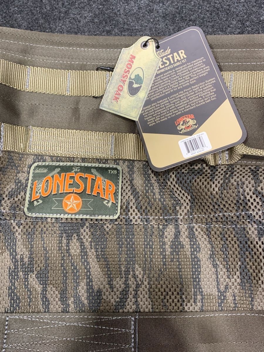 LATITUDE OUTDOORS Lonestar Saddle Regular Mossy Oak Bottomland