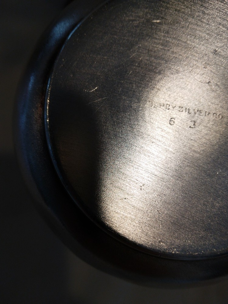 Beautiful small antique silver plated or silver pitcher.