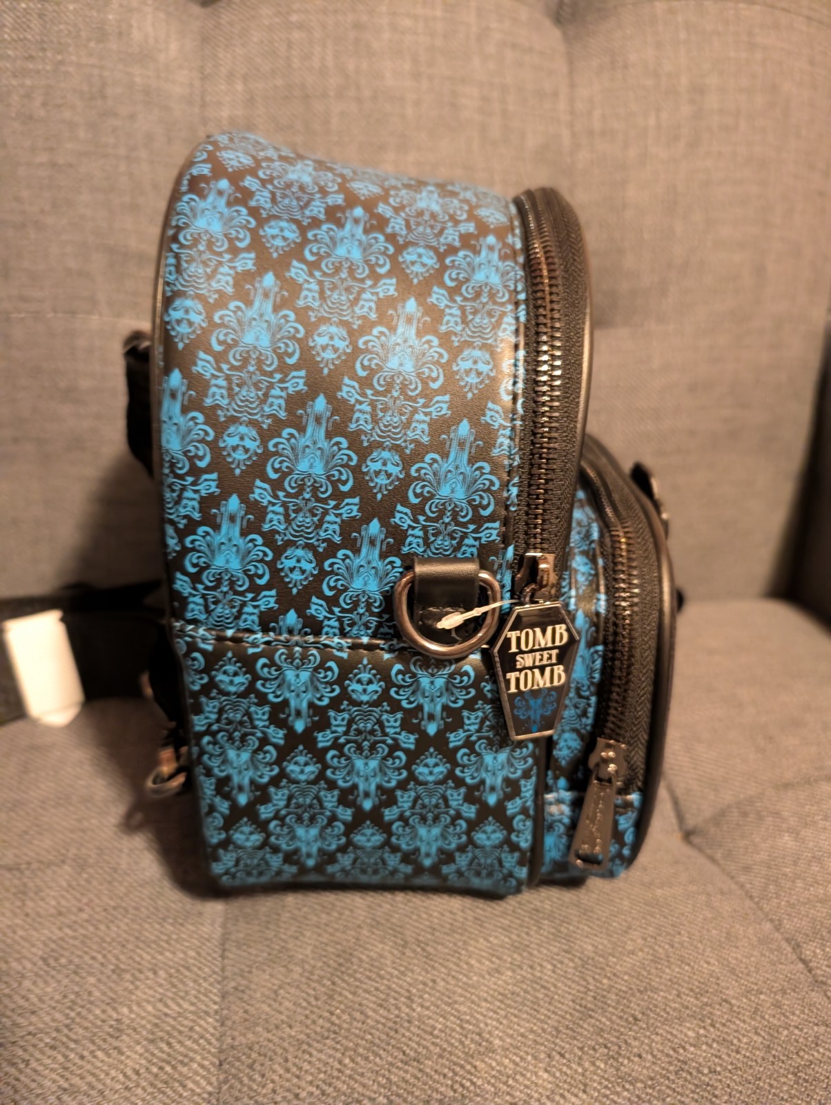 Loungefly Disney Haunted Mansion Hitchhiking Ghosts Convertible Glow Backpack