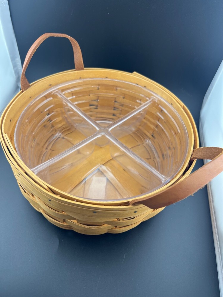 Round Longaberger Serving Basket with divided plastic protector. excellent condi