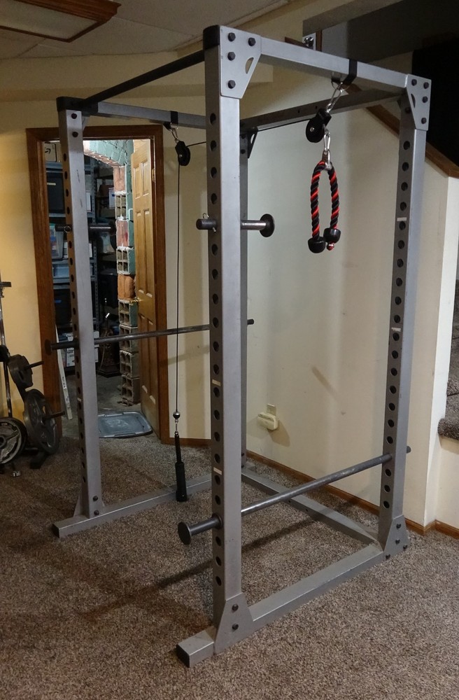 Body Solid power rack with pulley system for lifting weights - used