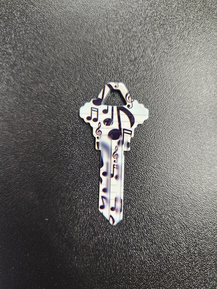 MUSIC NOTES PRINTED SCHLAGE SC1 KEYBLANK - READ DETAILS BELOW