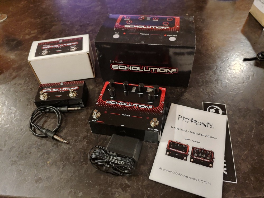 New-in-box PIGTRONIX Echolution 2 Delay with Matching Footswitch