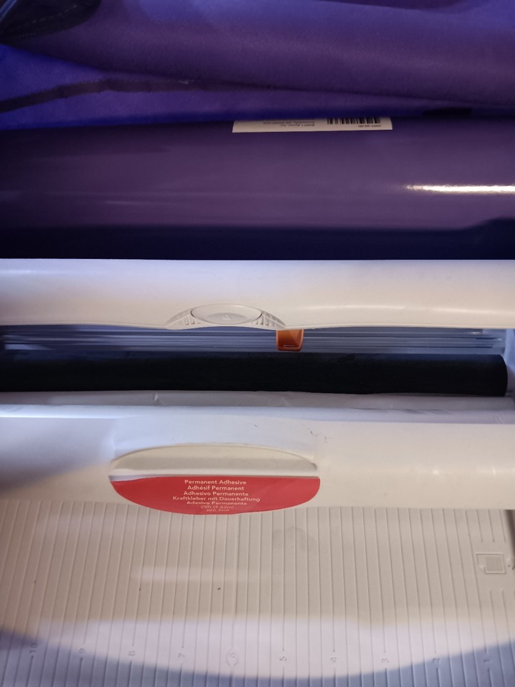 Xyron Creatopia Laminate & Emboss Multifunction 12” look on utube