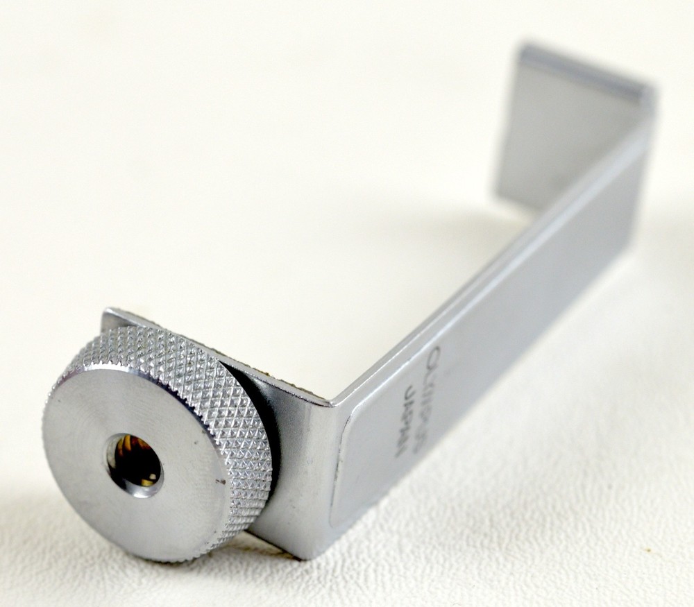 Olympus Pen (EE, D) accessory/flash shoe bracket.