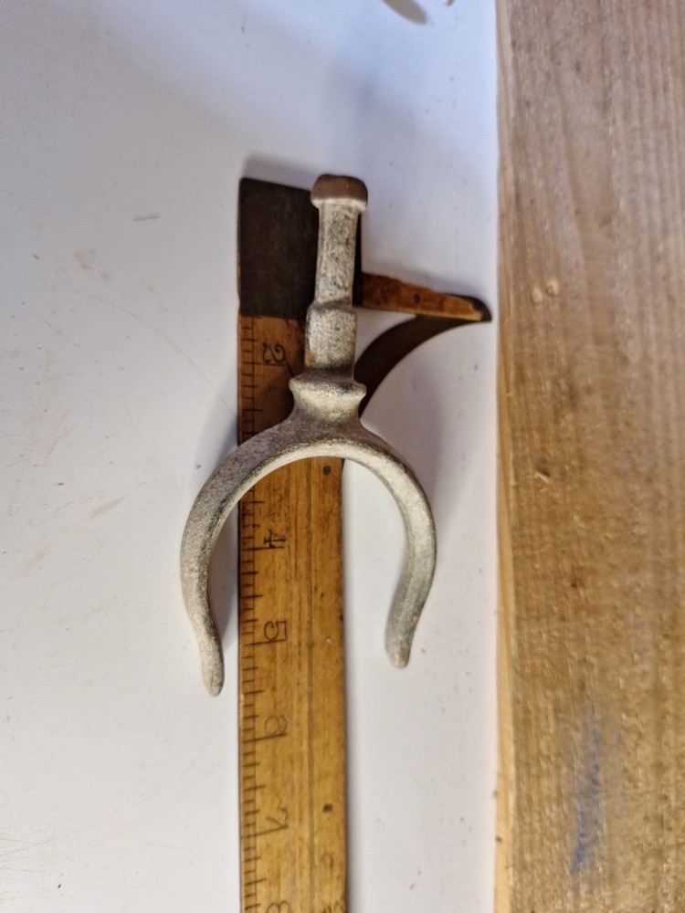 Antique boat oar lock rests
