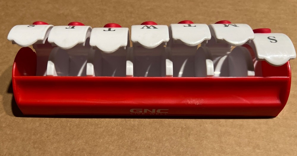 GNC 7 Day Pill Box - 7 Different Compartments - Plastic - Red/White