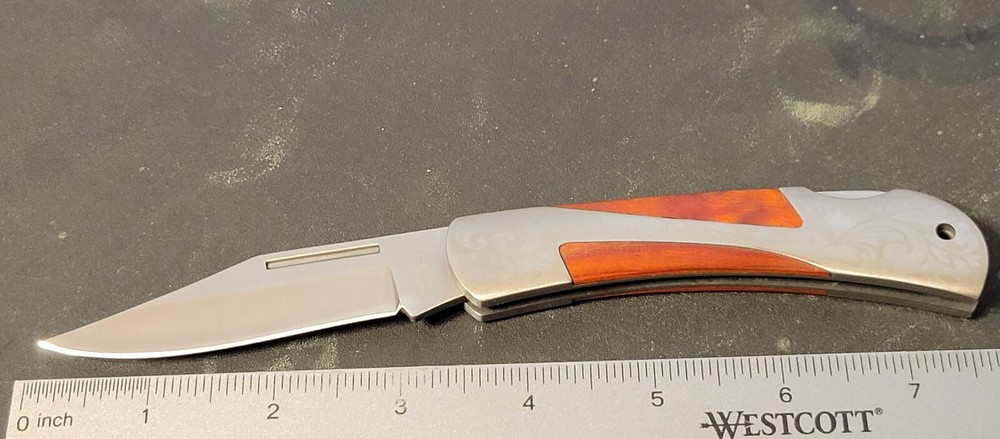 TIMBER WOLF Knife Lockback Scroll Worked Handle W/Wood Inlay NOS