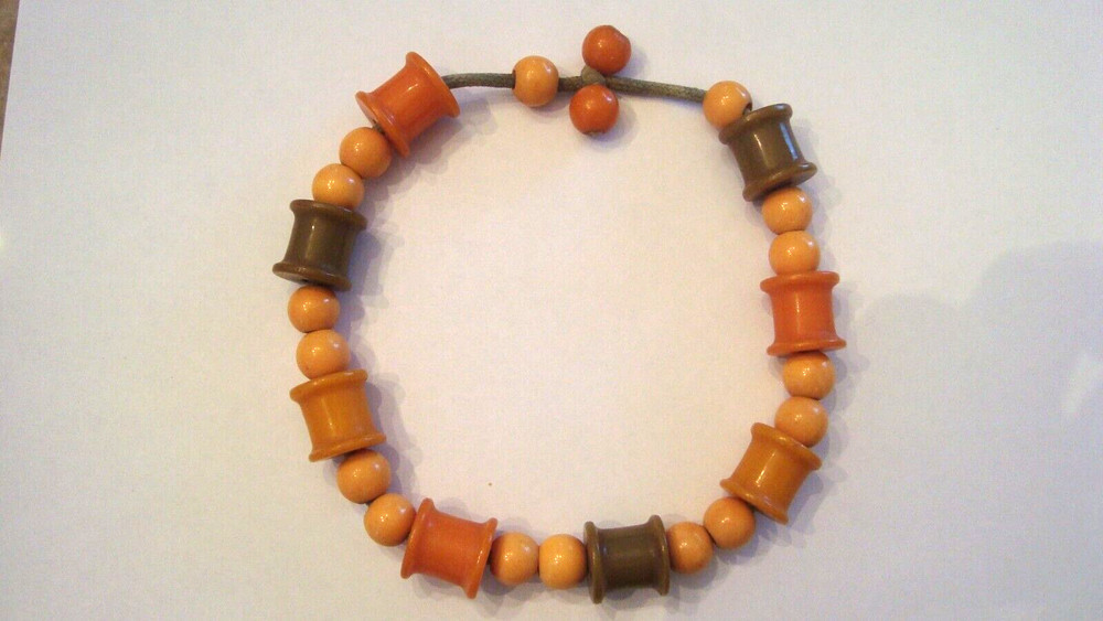 Vintage Bakelite Thread Spools and Bakelite Beads