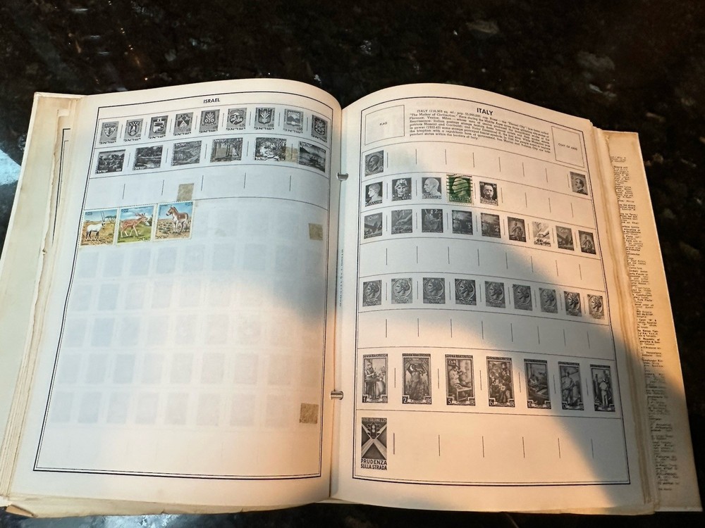 VTG 1977 Traveler Stamp Album With Many Stamps.