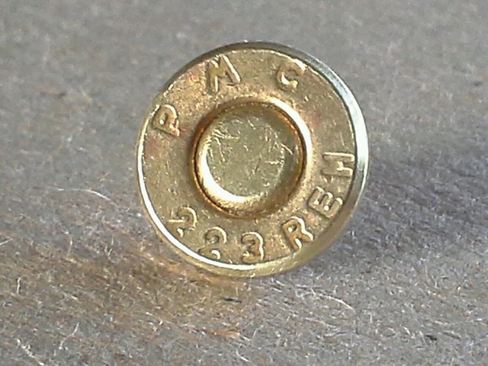 .223 Caliber Bullet Lapel Pin. Unique un-dented primer! Most caliber available