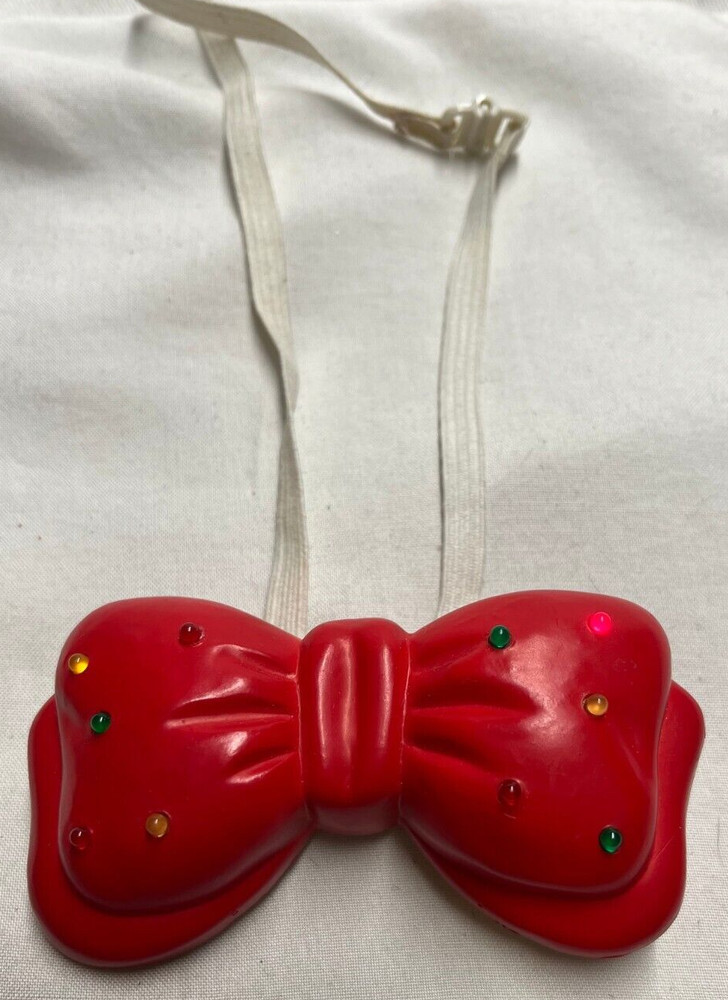 Blinking Light up plastic bow tie- Needs 2 AAA Batteries