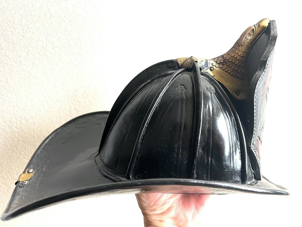 John Olson Vintage leather firefighters helmet.