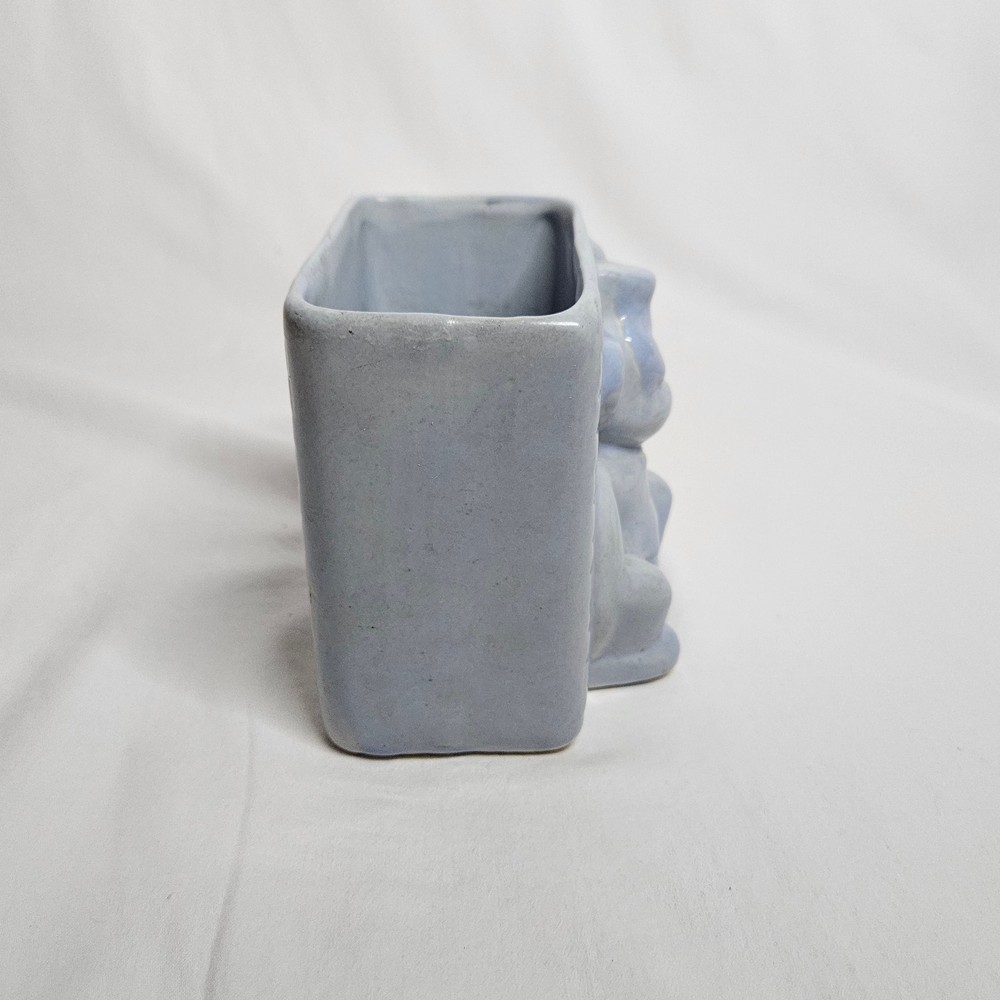 Vintage Niloak Circus Monkey planter, light blue, 4" tall