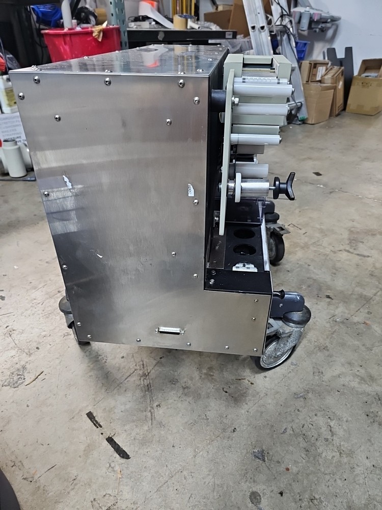 Fluidose 5H Liquid Repackaging Machine From Working Environment