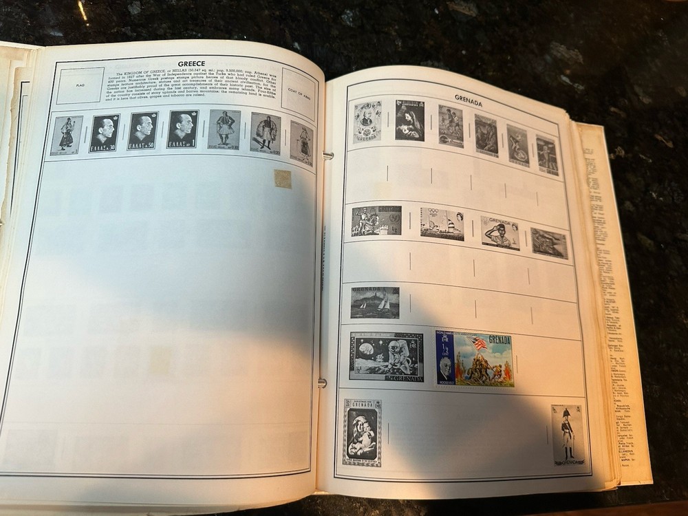 VTG 1977 Traveler Stamp Album With Many Stamps.