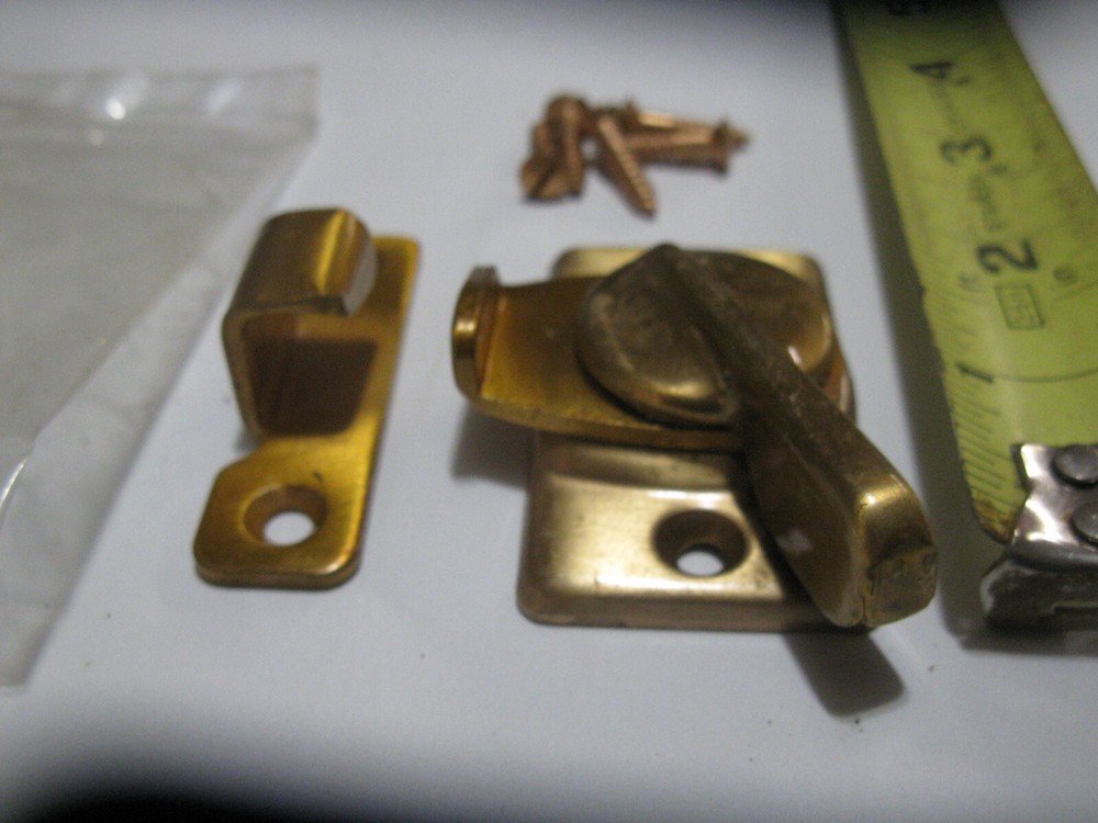 National Hardware Sash Lock in brass finish