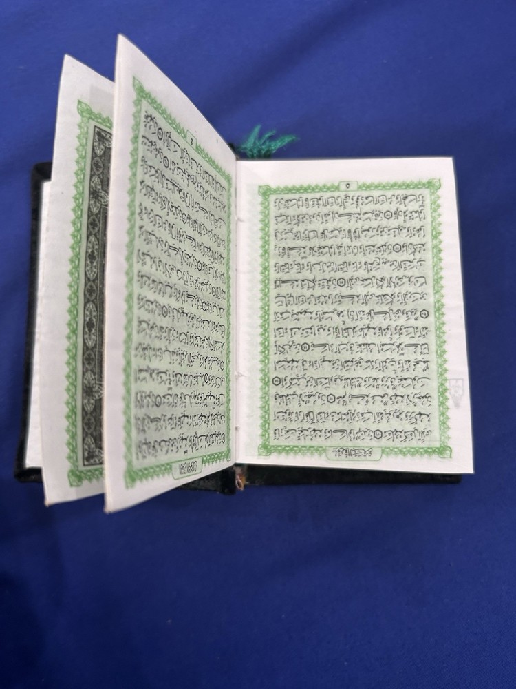 Decorative Silver-tone Islamic Prayer Book with Arabic Script