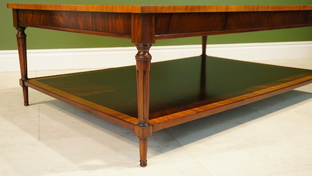 Rectangular Flamed Mahogany Coffee table with banding and lower shelf