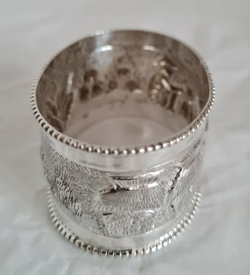 Antique oriental Napkin ring . Marked Sterling silver.