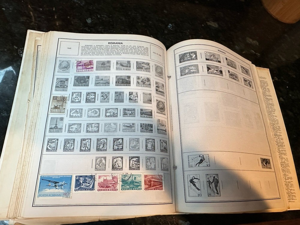 VTG 1977 Traveler Stamp Album With Many Stamps.